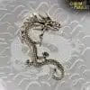 Boucles d'oreilles Amulette <br> Manchette d'oreille en forme de dragon 13 Dragon Ear Cuff Bronze Background Dragon charm and amulet 2 | Charm and Amulet™