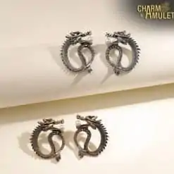 Dragon-Errings gold and silver on table-Charm-and-Amulet